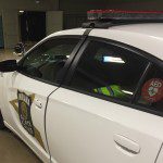 ISP patrol car with red sticker to identify police vehicle is AED equipped