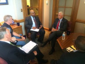 . Pictured from left to right are Deputy Chief of Staff for Public Safety John Hill, Indiana State Police Superintendent Doug Carter, Indiana Civil Rights Commission Executive Director Rick Hite, Governor Mike Pence, and Special Assistant to the Governor Tony Kirkland.